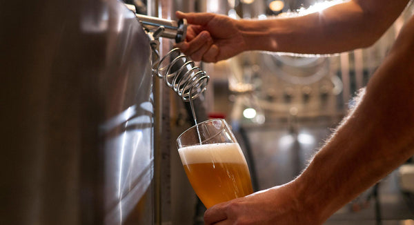 side-view-man-working-beer-factory_392cfaa8-5982-44b6-b26b-9c61bd15b560